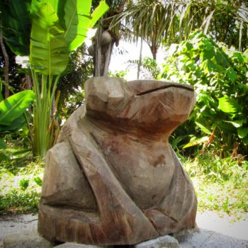 A massive wooden frog
